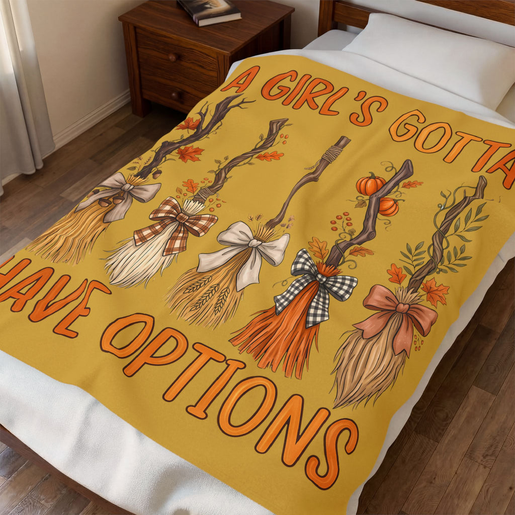 Fall brooms, cozy blanket